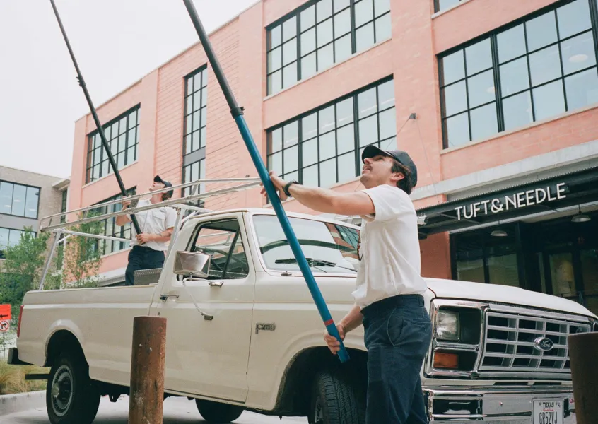 Pink's Exterior Window Cleaning in front of Tuft & Needle